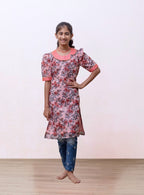 Peach floral printed Chanderi kurti with fancy peter pan collar and mutton sleeves with gotta patti highlight for Girls