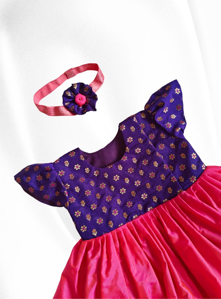 Purple  brocade with hot pink silk front open newborn baby girl frock for naming ceremony with bonnet,bloomer & booties.It's the perfect outfit for your naamkaran or annaprashan ceremony.Traditional dress for Noolukettu Ceremony,Pachavi Puja,cradle ceremony,Rice Ceremony,Chatti Puja etc.Apt gifting idea 