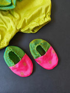 Pink soft brocade & green front open layered dress with bloomer,headband,booties for a newborn baby girl.It's the perfect outfit for your baby's naming ceremony,naamkaran or annaprashan ceremony.Traditional dress for Noolukettu Ceremony,Pachavi Puja,cradle ceremony,Rice Ceremony,Chatti Puja etc. Apt gifting idea