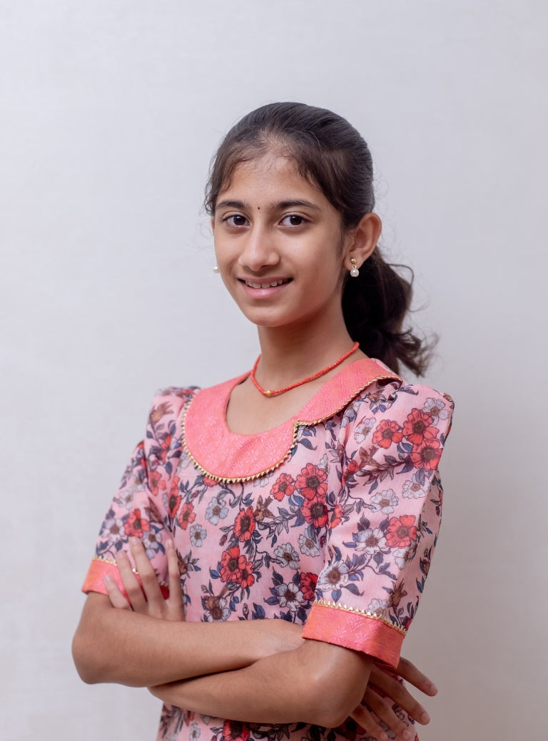 Peach floral printed Chanderi kurti with fancy peter pan collar and mutton sleeves with gotta patti highlight for Girls