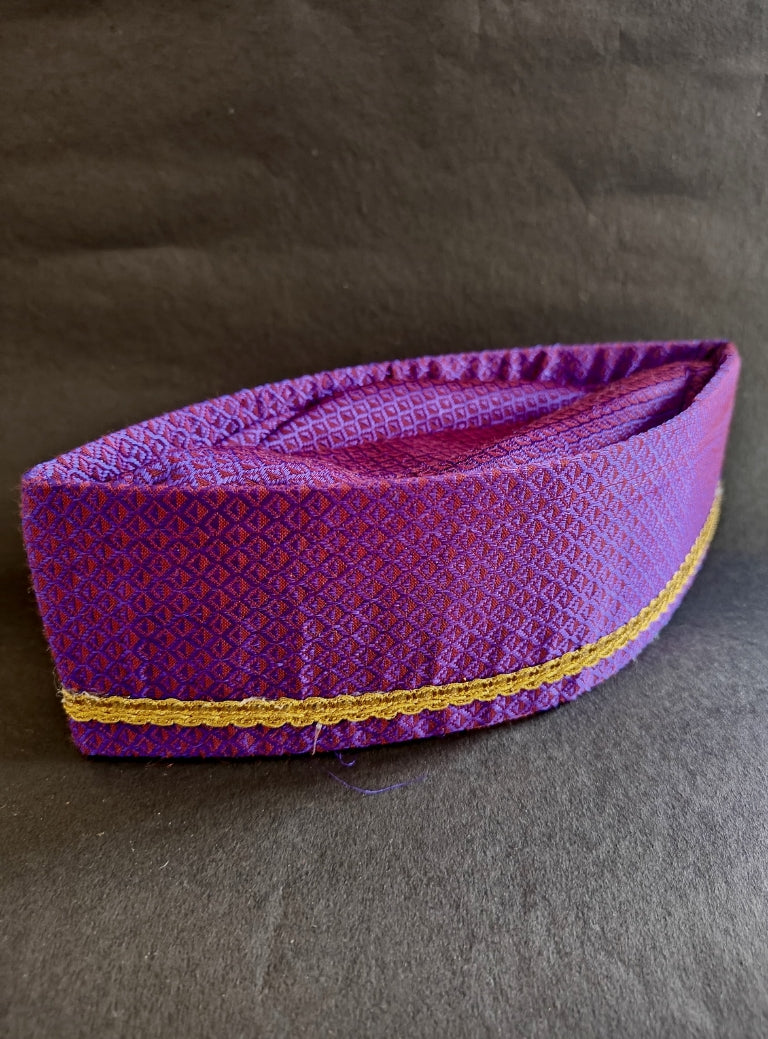 Purple Handloom Khunn Yajman Topi.Perfect Accessory for any Puja or Festival.Mundavalya,kanthi,bhikbali,topi,pagdi are boys accessories exclusively designed using Pearls,glass beads,jadau & gold plated findings for Batu,for Upanayan/Vratabandha/munj /thread ceremony.
