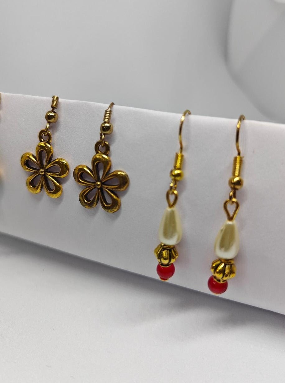 Accessories gifts fancy traditional ethnic trendy handmade accessories handcrafted matching assorted mix n match pearl multicolour metal golden nath nose pin nathani Marathi gold plated Maharashtrian accessory zumka jhumka moti vel single layer double layer dangling 