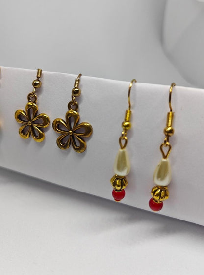Accessories gifts fancy traditional ethnic trendy handmade accessories handcrafted matching assorted mix n match pearl multicolour metal golden nath nose pin nathani Marathi gold plated Maharashtrian accessory zumka jhumka moti vel single layer double layer dangling 