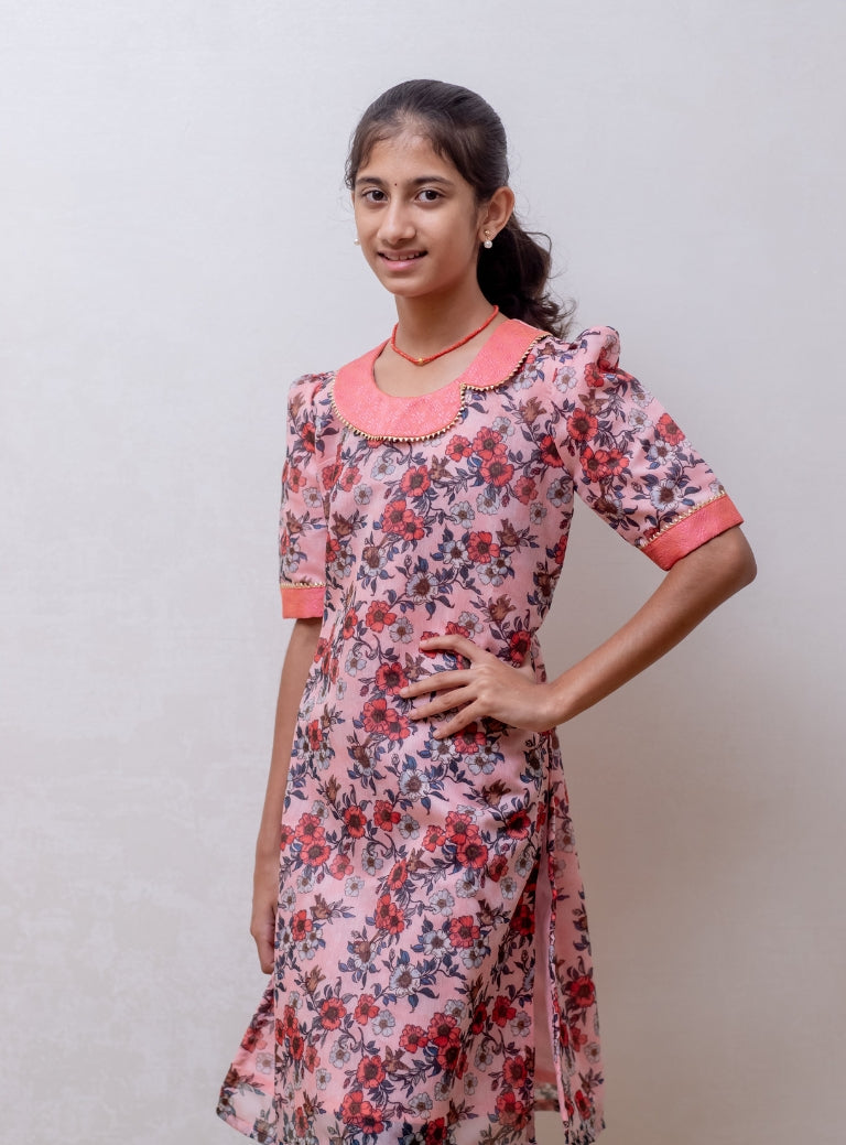 Peach floral printed Chanderi kurti with fancy peter pan collar and mutton sleeves with gotta patti highlight for Girls