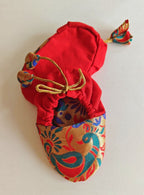red Peacock Paithani Motif, adjustable unisex Newborn Baby Mojaris /Booties.Paithani motif unisex booties for baby. Team these with any ethnic dress and complete the royal look! Completely made out of fabrics inside out , make these booties perfectly comfy first ethnic wear for the newborn.