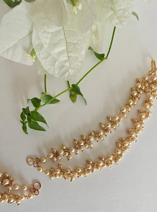 Earrings Extensions in semi cultured pearls Double Lined. Can be used along with any zumka for a perfect traditional look. Adorn your princess with head to toe premium quality handcrafted accessories made from allergy free, best quality materials.