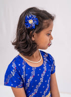 Ink blue banaras satin brocade silk gown with cap sleeves and ruffled flare for Girls.Let your princess be as comfortable as in her casuals with carefully designed & crafted Comfort Ethnic Wear by Soyara Ethnics.Keep her fashion quotient high with timeless patterns, vibrant combinations and royal textiles.
