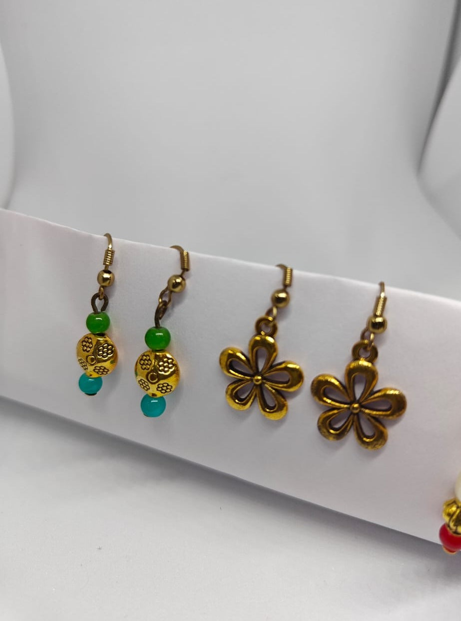 Accessories gifts fancy traditional ethnic trendy handmade accessories handcrafted matching assorted mix n match pearl multicolour metal golden nath nose pin nathani Marathi gold plated Maharashtrian accessory zumka jhumka moti vel single layer double layer dangling 