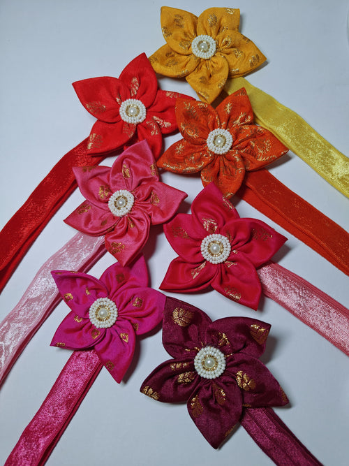 Bright Coloured Sadafuli Flower Stretchable headband for baby girl.Adorn your princess with head to toe premium quality handcrafted accessories made from allergy free, best quality materials.