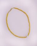 Turmeric Yellow glass beads necklace with gold plated findings and an oval pearl pendant for Girls