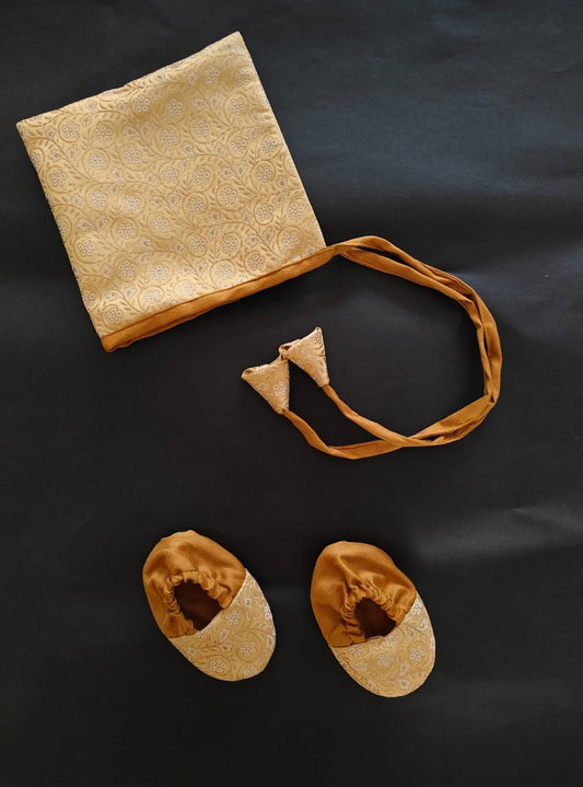 Golden Paithani Naming Ceremony Combo for Baby Boy includes Bonnet,Booties.Golden brocade bonnet,paithani booties,fabric headbands all these Handcrafted accessories for Newborn are perfect add ons to any traditional attire of the baby.Designer baby mats,set of generic bloomers are other naming ceremony essentials.