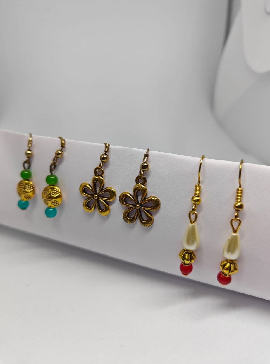 Accessories gifts fancy traditional ethnic trendy handmade accessories handcrafted matching assorted mix n match pearl multicolour metal golden nath nose pin nathani Marathi gold plated Maharashtrian accessory zumka jhumka moti vel single layer double layer dangling 