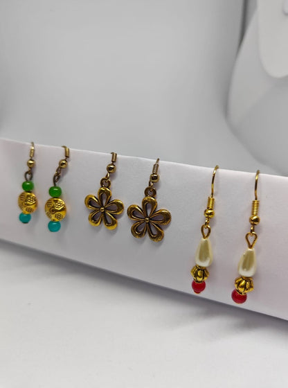 Accessories gifts fancy traditional ethnic trendy handmade accessories handcrafted matching assorted mix n match pearl multicolour metal golden nath nose pin nathani Marathi gold plated Maharashtrian accessory zumka jhumka moti vel single layer double layer dangling 