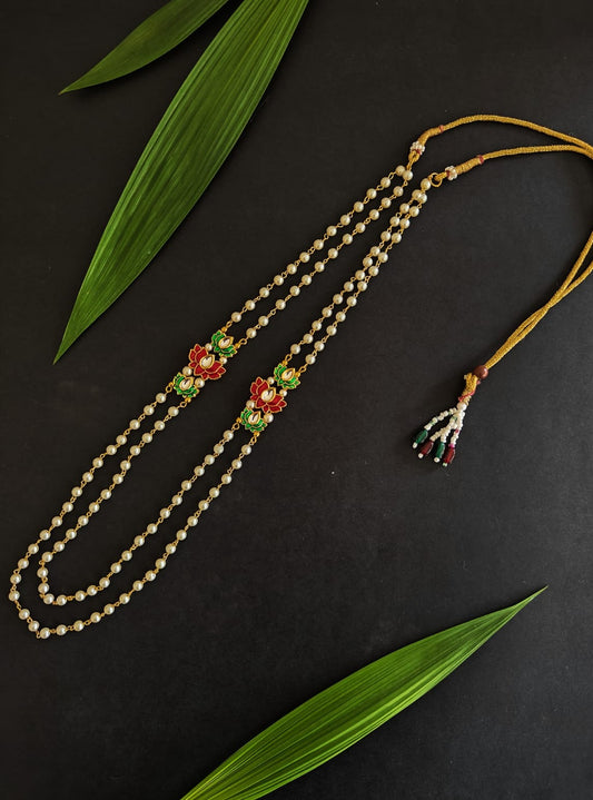 Pearl Double Layer Kanthi with Round flower shaped kundan pendant for Batu.It is worn by Batu for Vratabandh/Munj/Upnayan/ ThreadCeremony. Mundavalya,kanthi,bhikbali,topi,pagdi are boys accessories exclusively designed using Pearls,glass beads,jadau & gold plated findings for Batu,for Upanayan/Vratabandha/munj /thread ceremony.