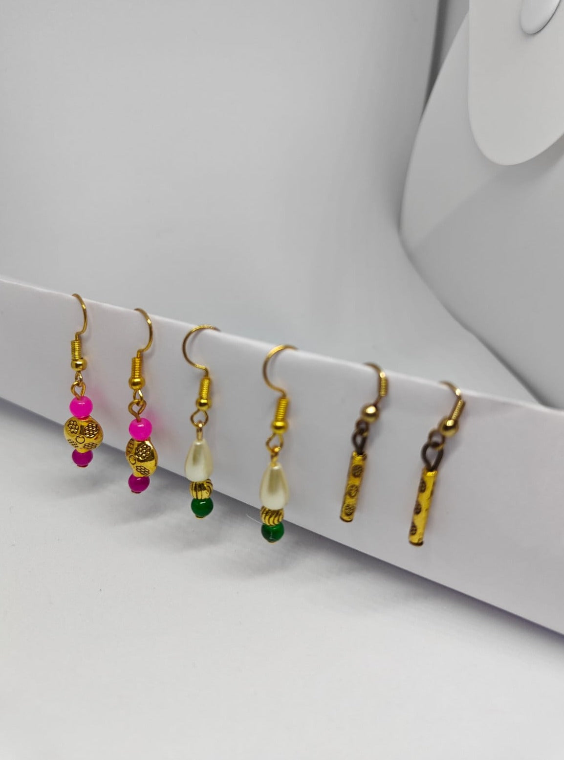 Accessories gifts fancy traditional ethnic trendy handmade accessories handcrafted matching assorted mix n match pearl multicolour metal golden nath nose pin nathani Marathi gold plated Maharashtrian accessory zumka jhumka moti vel single layer double layer dangling 