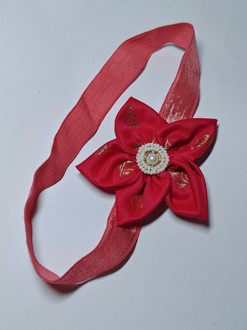 Bright Coloured Sadafuli Flower Stretchable headband for baby girl.Adorn your princess with head to toe premium quality handcrafted accessories made from allergy free, best quality materials.