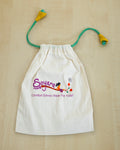 White drawstring bag also known as batwa with 'Soyara' logo ,perfect sustainable gift wrapping for accessories .