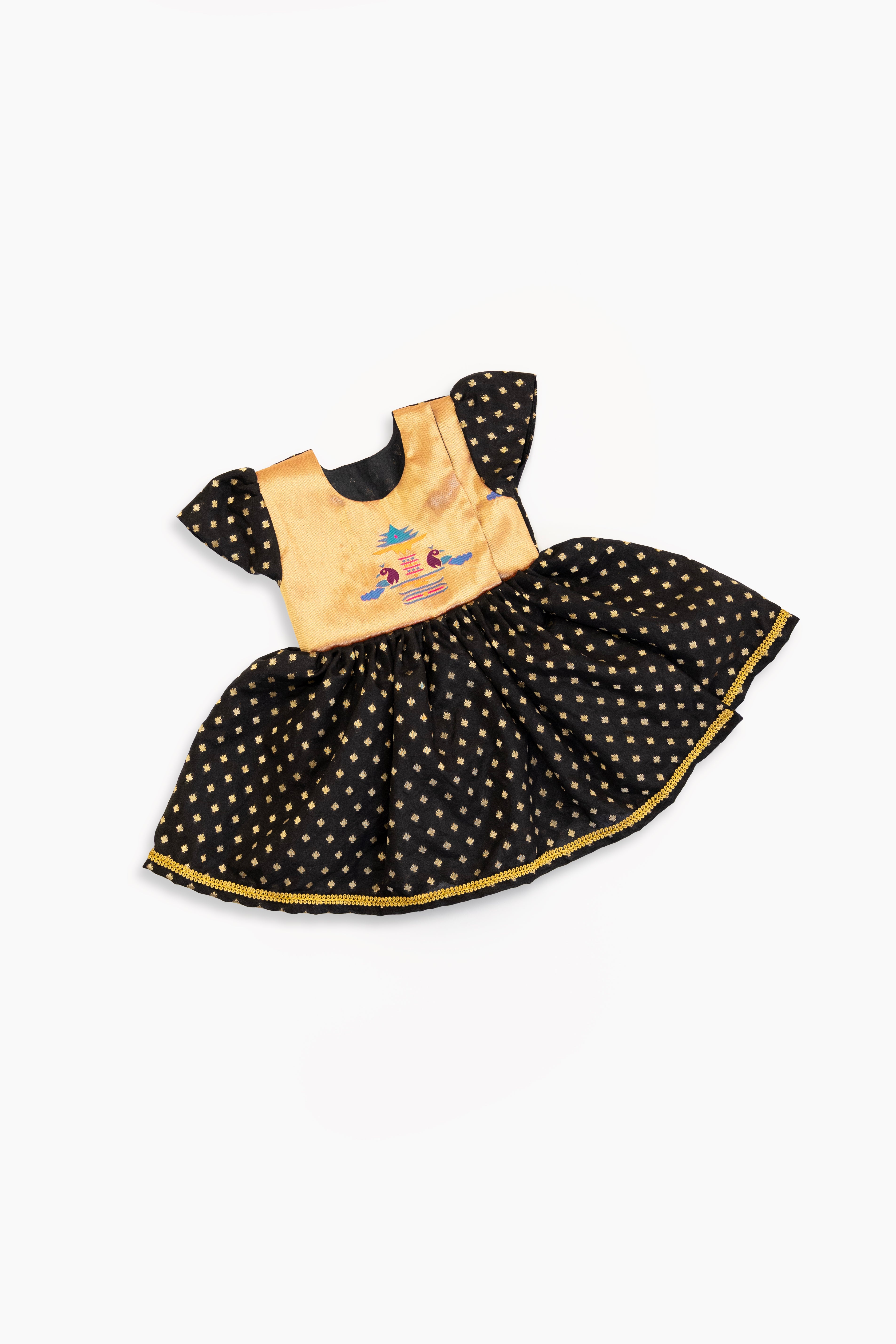 Brocade bodice with plain black pooja silk bottom highlighted with golden border for girls (Copy)