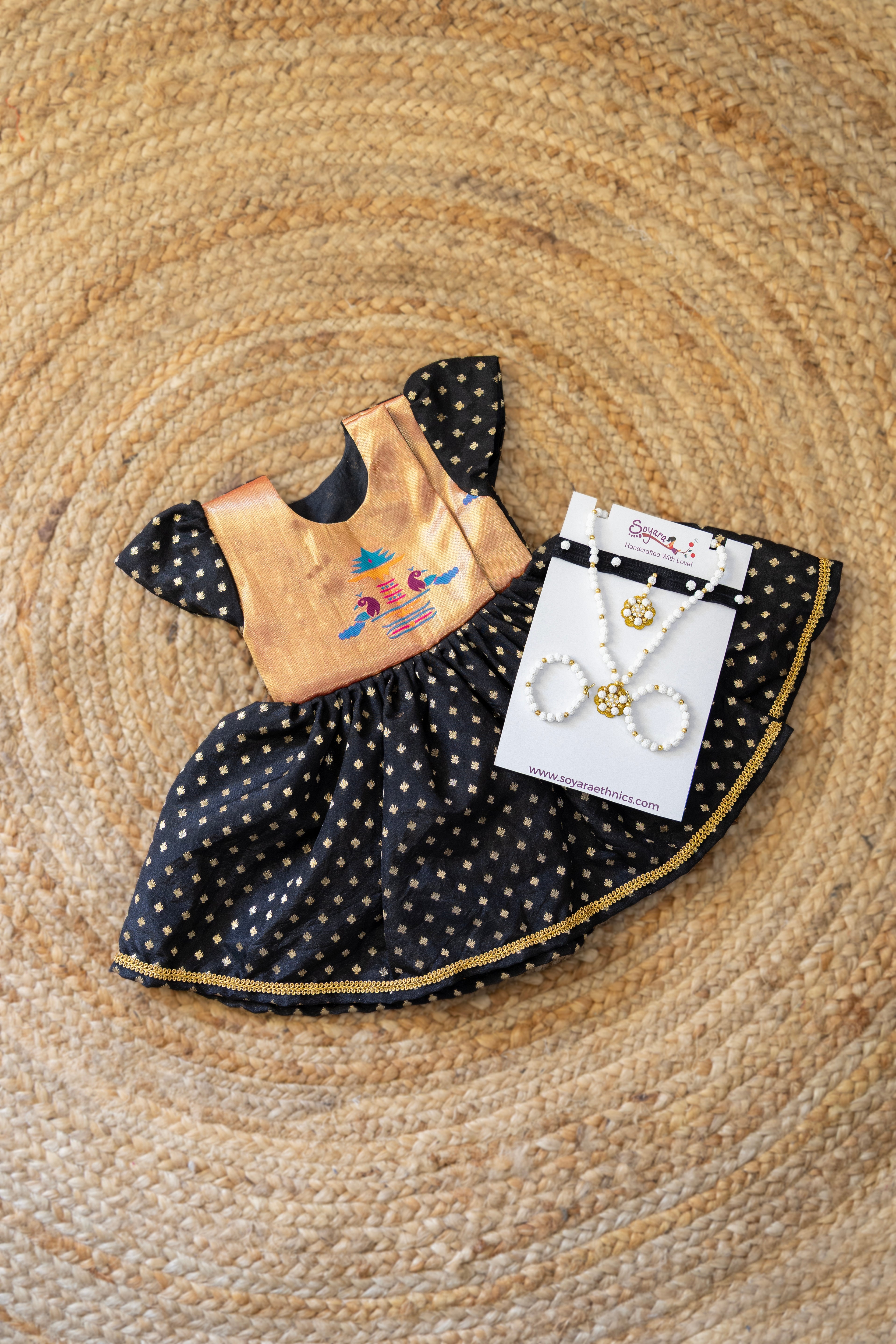 Brocade bodice with plain black pooja silk bottom highlighted with golden border for girls (Copy)