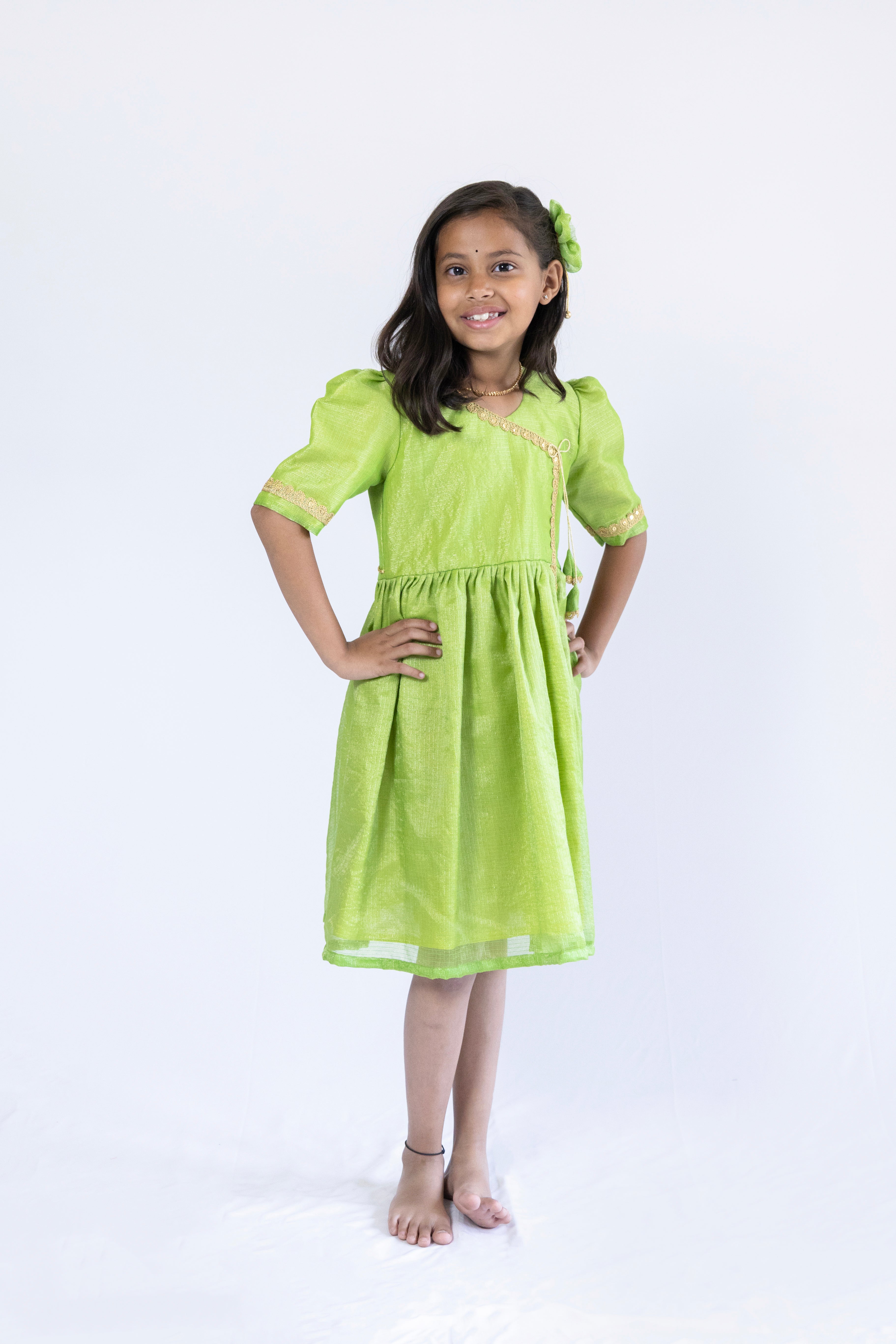 Parrot green tissue silk kotta angarkha frock / dress with golden lace embellishment for Girls