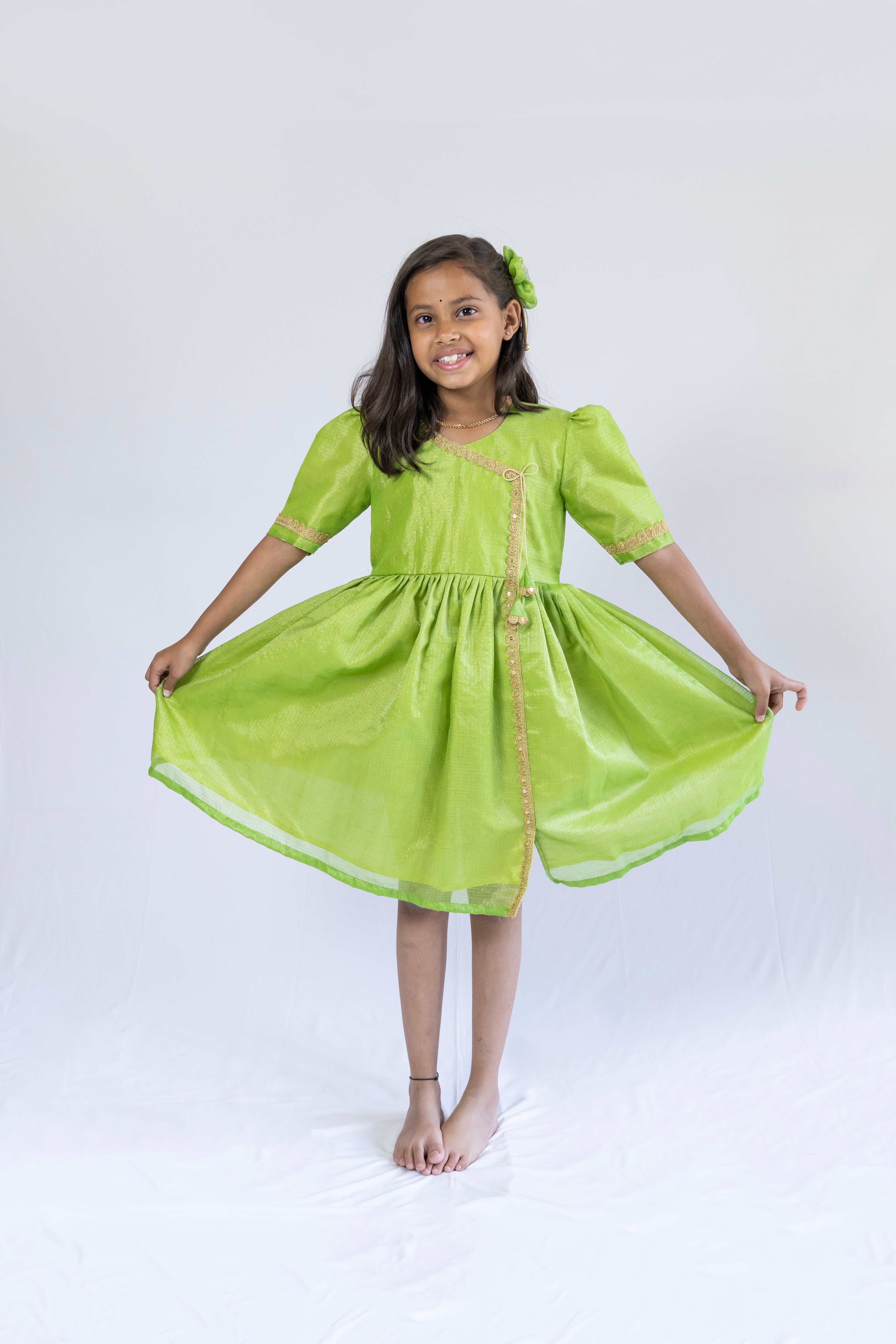 Parrot green tissue silk kotta angarkha frock / dress with golden lace embellishment for Girls