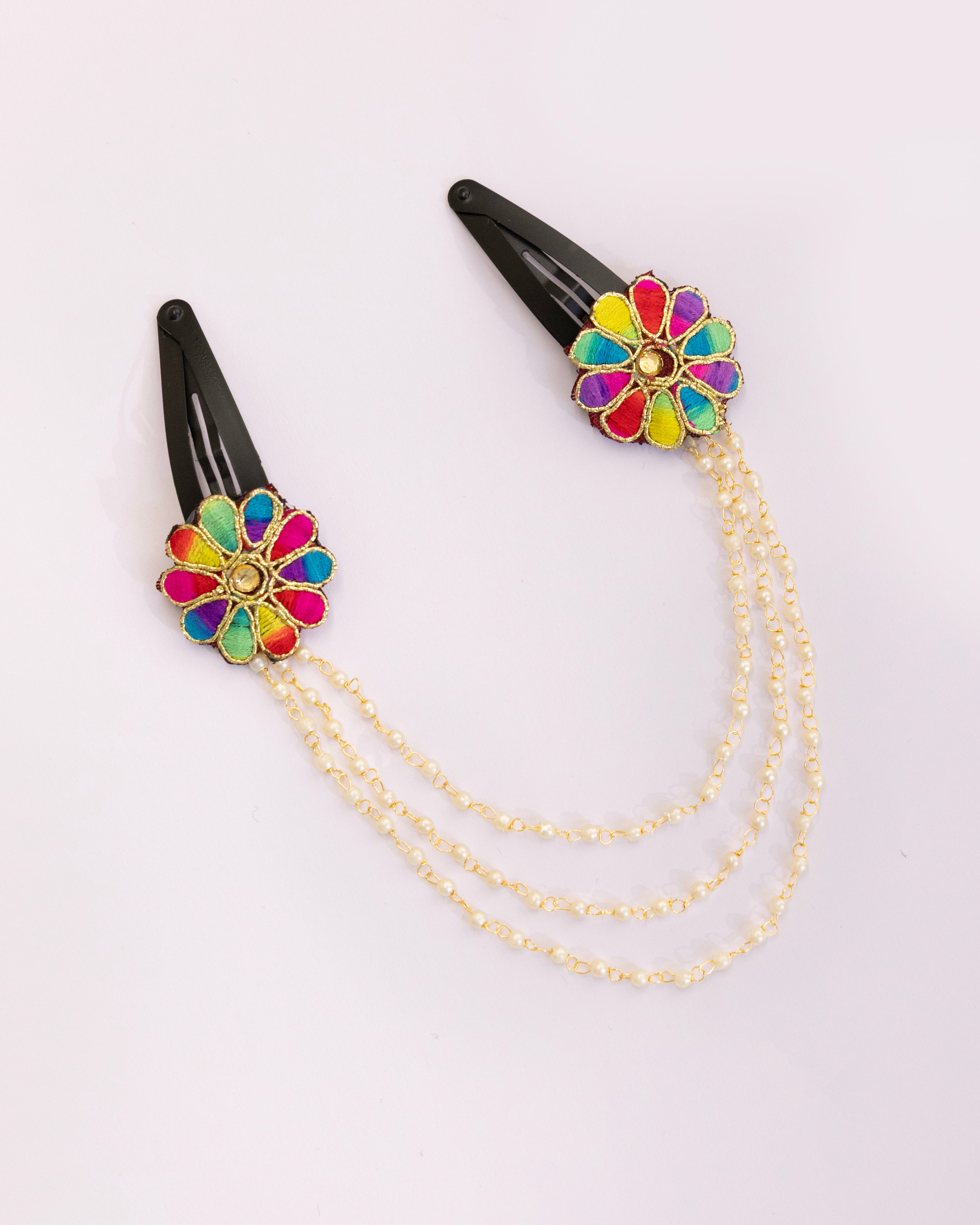 Triveni - Multicolor two flowers triple layer Pearl chain Hair clips for Girls Complement any party, festive, or casual outfit effortlessly with these elegant clips.