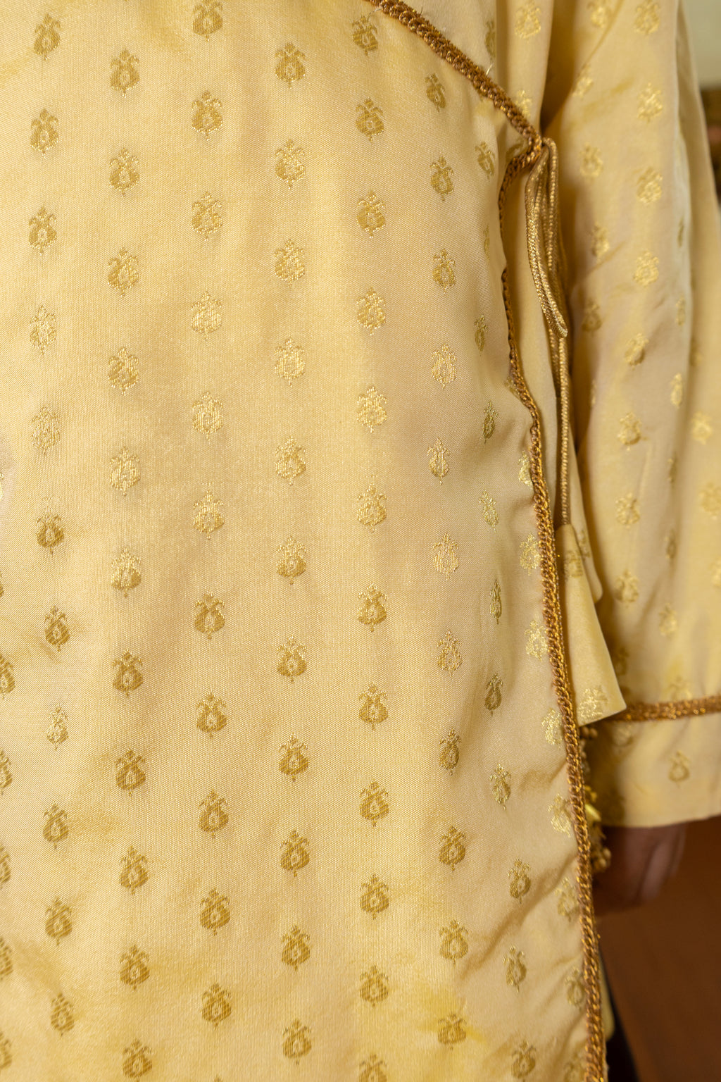 Cream coloured soft brocade silk kurta with angarakha pattern for Batu