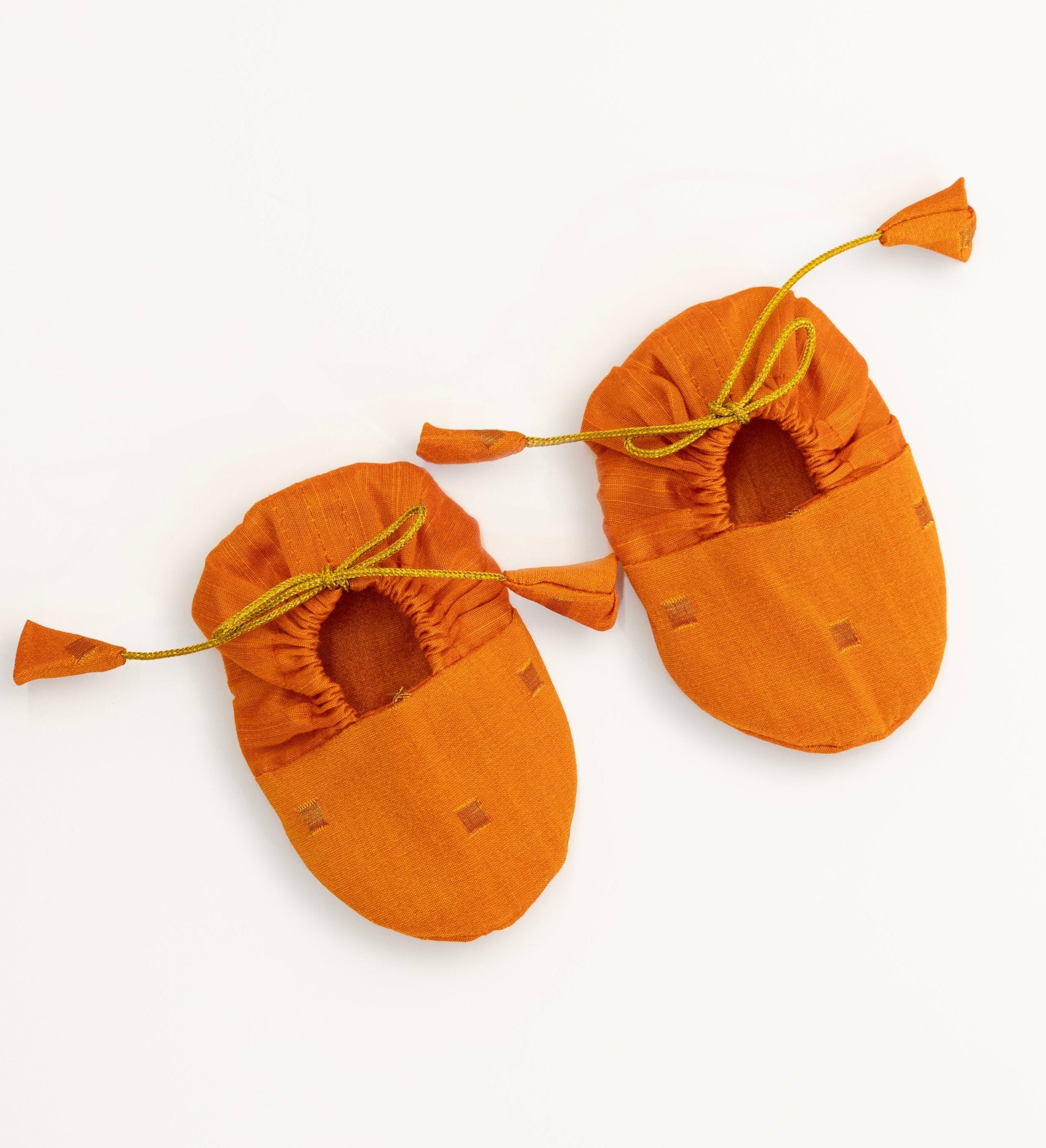Orange unisex raw silk booties for newborn baby