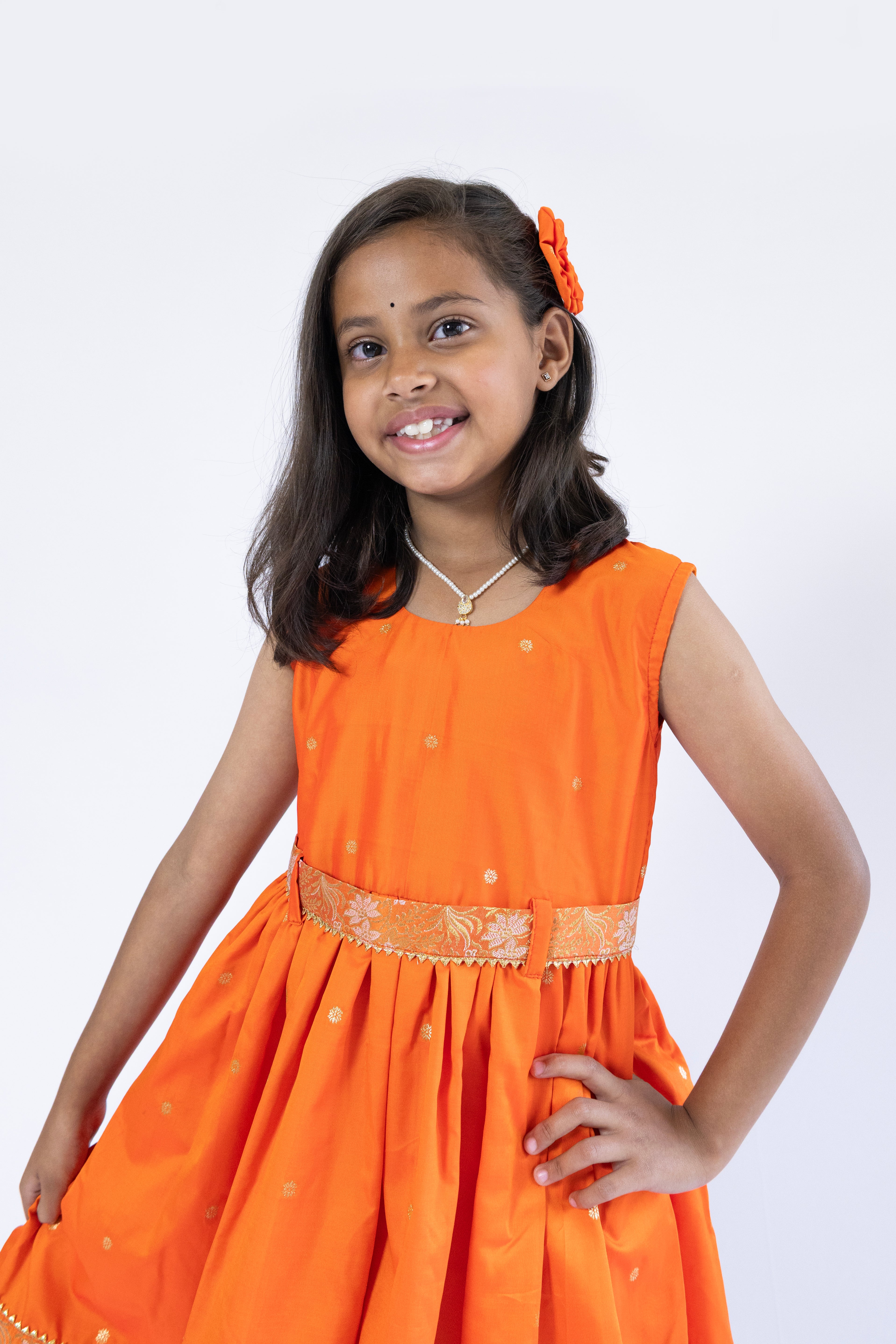 Orange soft banaras brocade silk frock / dress with light orange premium banaras brocade border and a removable jacket for girls