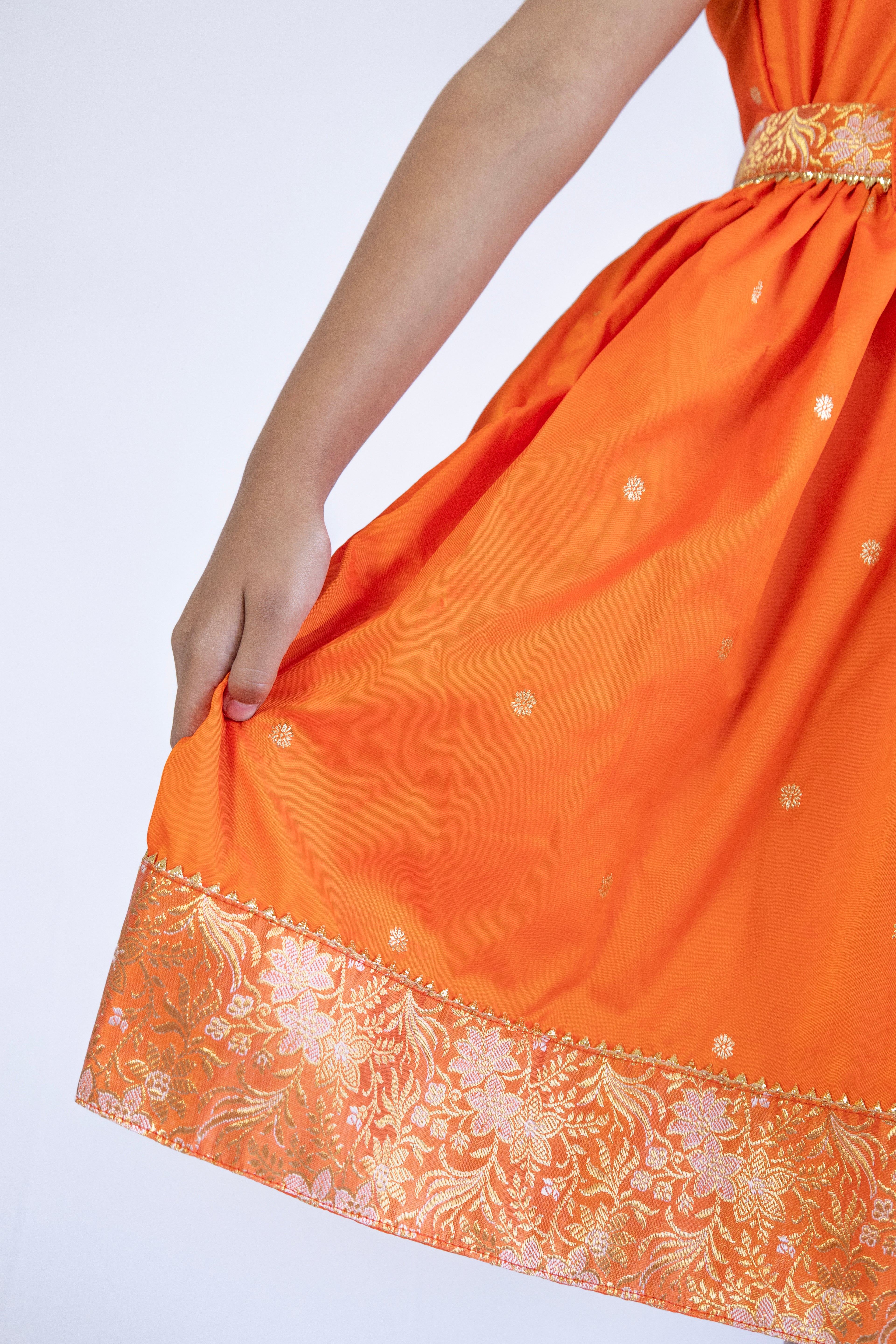 Orange soft banaras brocade silk frock / dress with light orange premium banaras brocade border and a removable jacket for girls