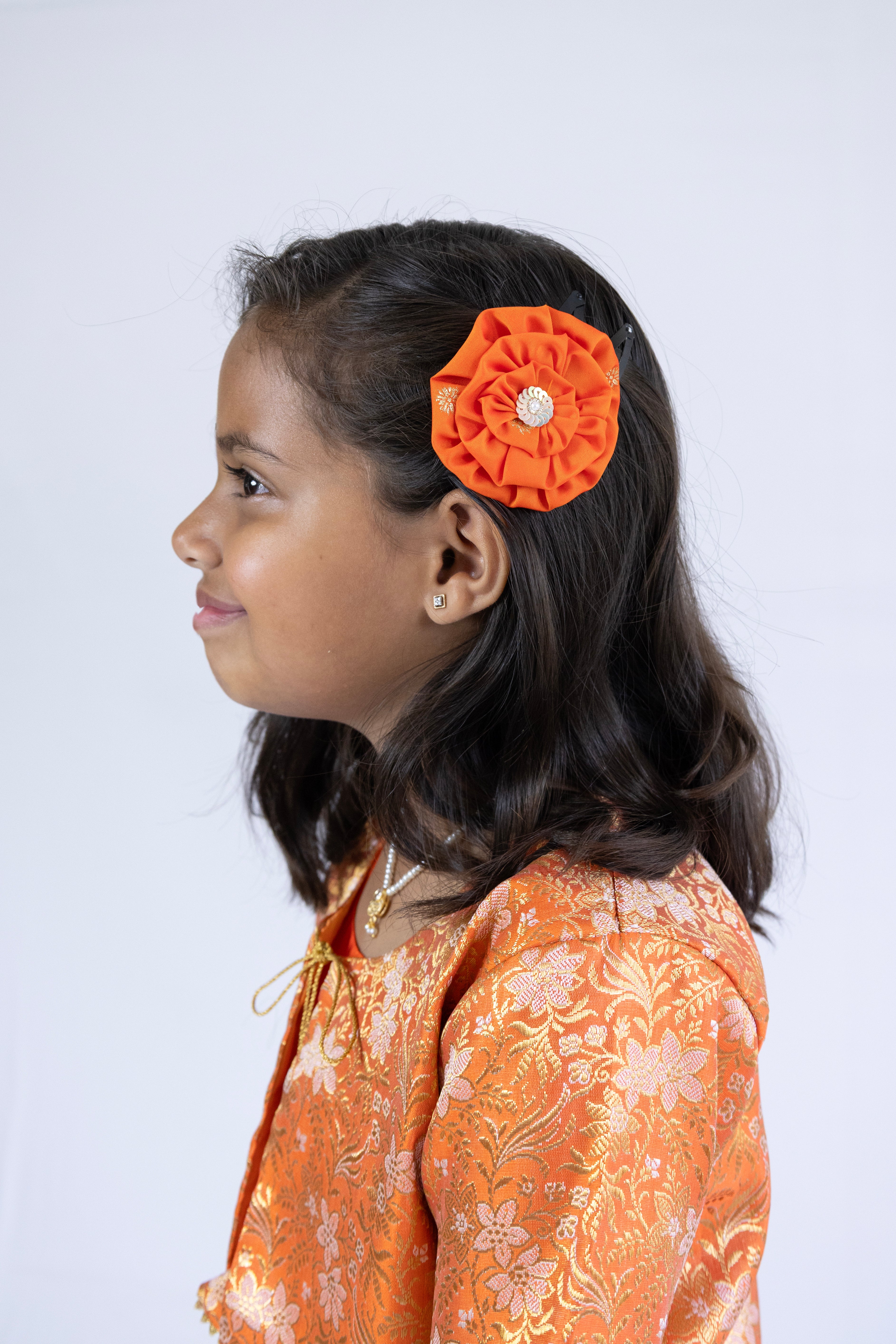 Orange soft banaras brocade silk frock / dress with light orange premium banaras brocade border and a removable jacket for girls