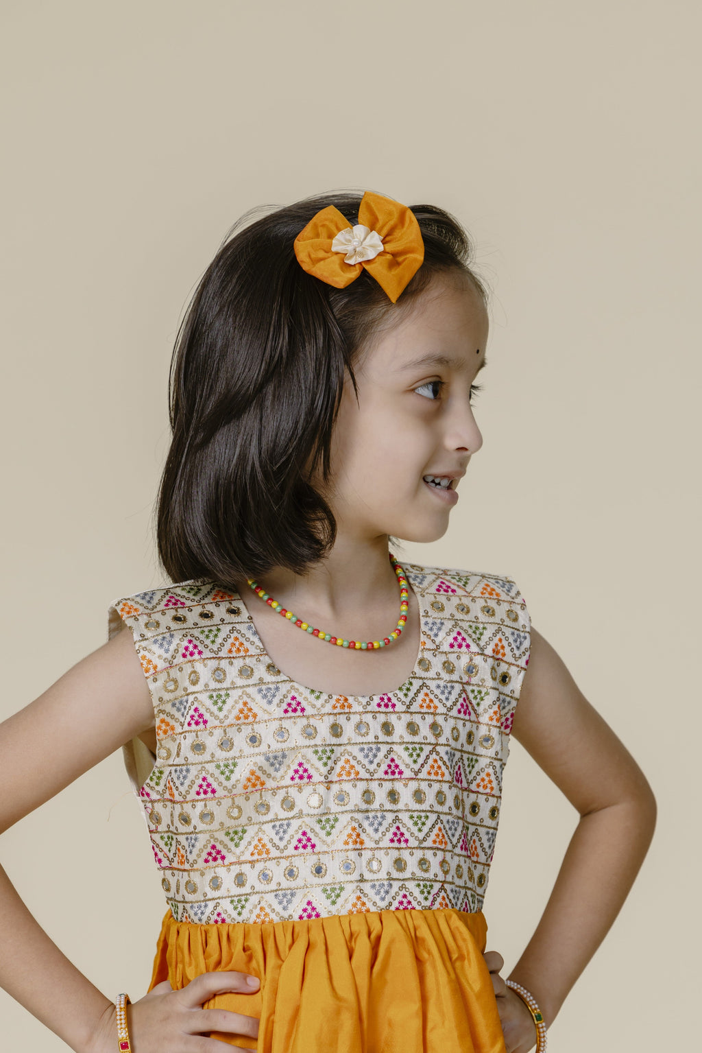Mustard Colored Handcrafted Mysore Silk Bow Motif Hairclip