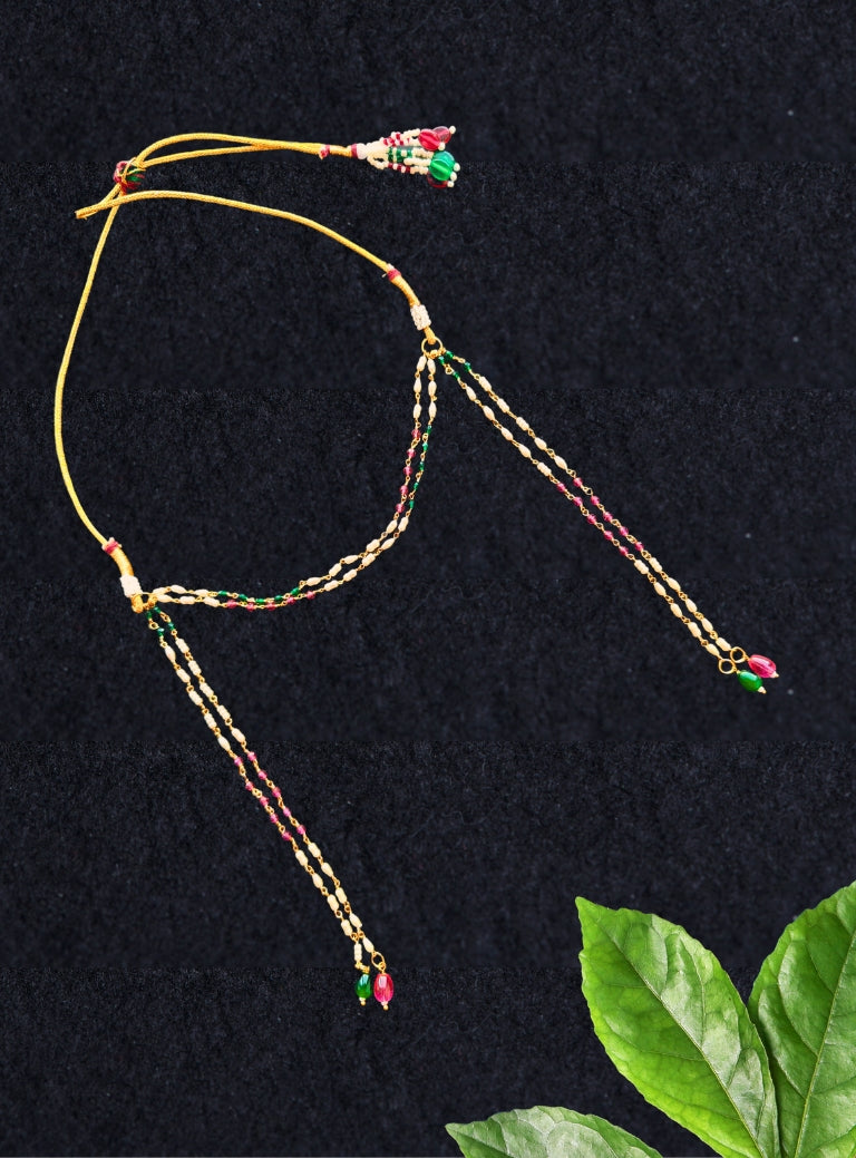 Rice pearls with pink and green crystals chain Mundavali for Vratbandha Ceremony.Mundavalya,kanthi,bhikbali,topi,pagdi are boys accessories exclusively designed using Pearls,glass beads,jadau & gold plated findings for Batu,for Upanayan/Vratabandha/munj /thread ceremony.