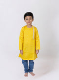 This yellow taffeta silk kurta for boys features a side placket adorned with sequined lace detailing. The garment is lined with cotton for enhanced comfort and superior quality.
