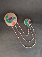 Handcrafted Parrot Paithani Brooch embellished with pearls and pearls strings.Perfect accessory for boys kurta. Mundavalya,kanthi,bhikbali,topi,pagdi are boys accessories exclusively designed using Pearls,glass beads,jadau & gold plated findings for Batu,for Upanayan/Vratabandha/munj /thread ceremony.