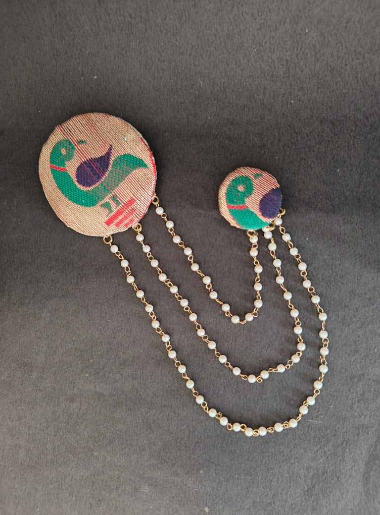 Handcrafted Parrot Paithani Brooch embellished with pearls and pearls strings.Perfect accessory for boys kurta. Mundavalya,kanthi,bhikbali,topi,pagdi are boys accessories exclusively designed using Pearls,glass beads,jadau & gold plated findings for Batu,for Upanayan/Vratabandha/munj /thread ceremony.