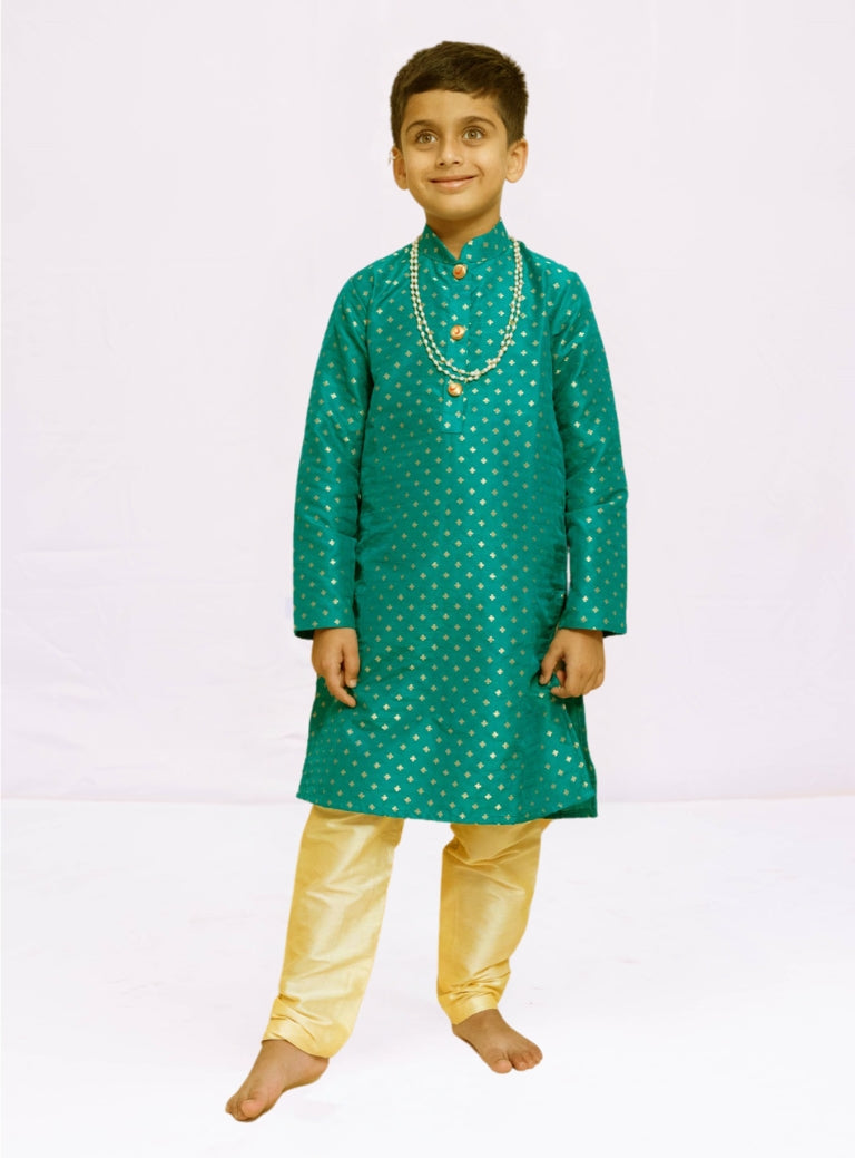 Emerald green brocade silk stand collar kurta with a cotton silk salwar and Paithani Shela.Kurtas with collar or Angrakha pattern teamed with salwar are the best choice for any festive occasion for boys. They are Trendy, Easy to wear and comfortable to carry.