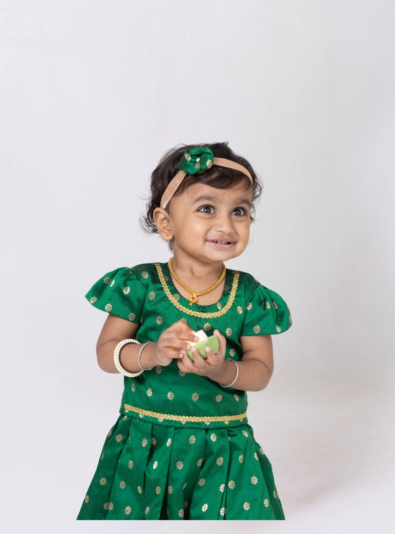 Bottle green Paithani brocade silk border Parkar Polka with puffed cap sleeves and golden lace embelishment around neck and waistline for girls
