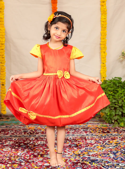 Orange Raw silk dress with yellow brocade sleeves and bow highlights for Girls