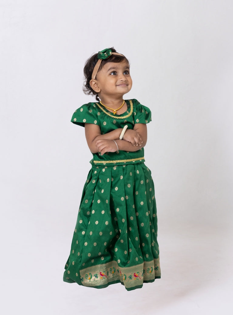 Bottle green Paithani brocade silk border Parkar Polka with puffed cap sleeves and golden lace embelishment around neck and waistline for girls