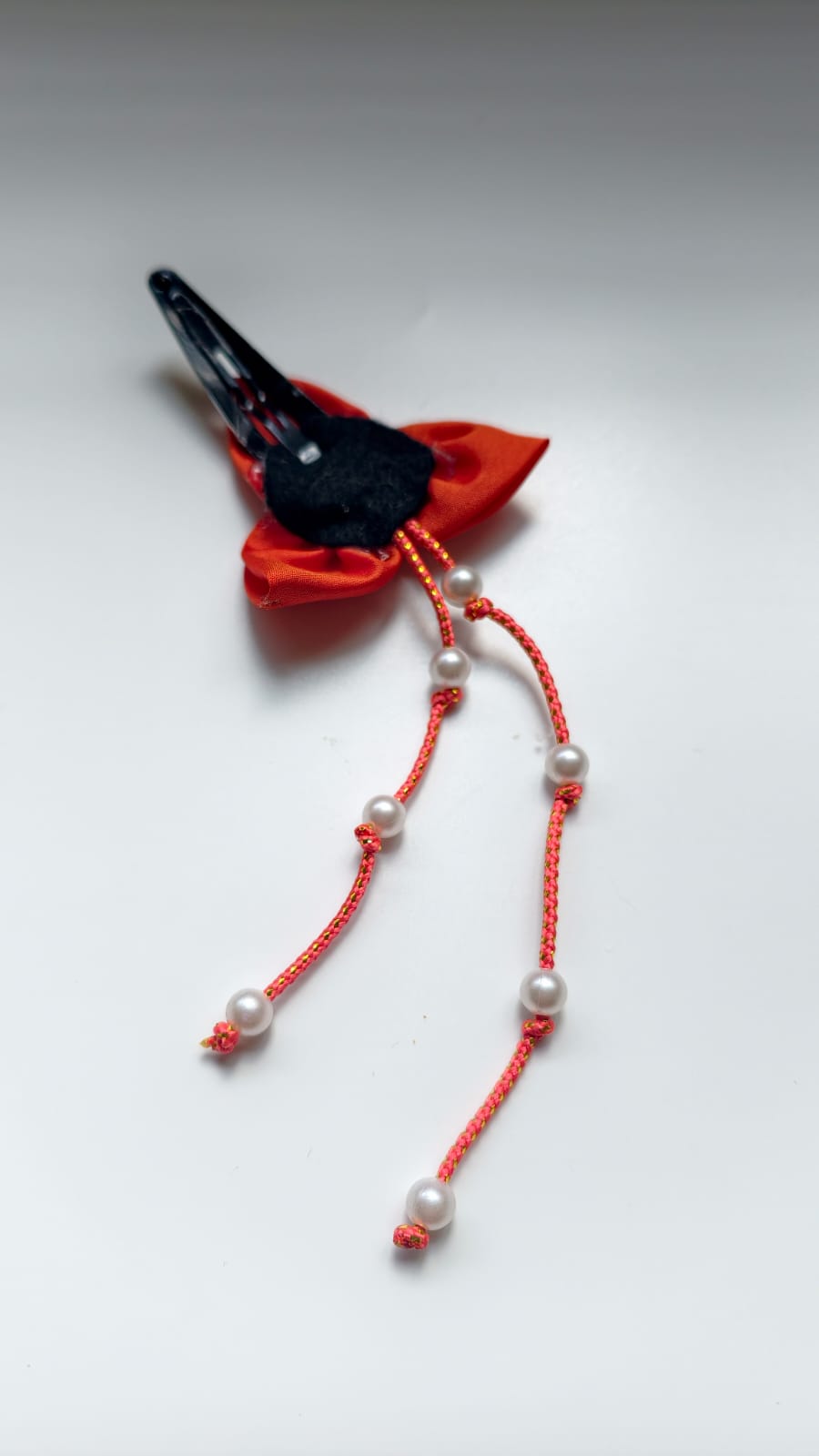 Bilwa Orange Fabric Hairclip With Dangling Pearls Strands