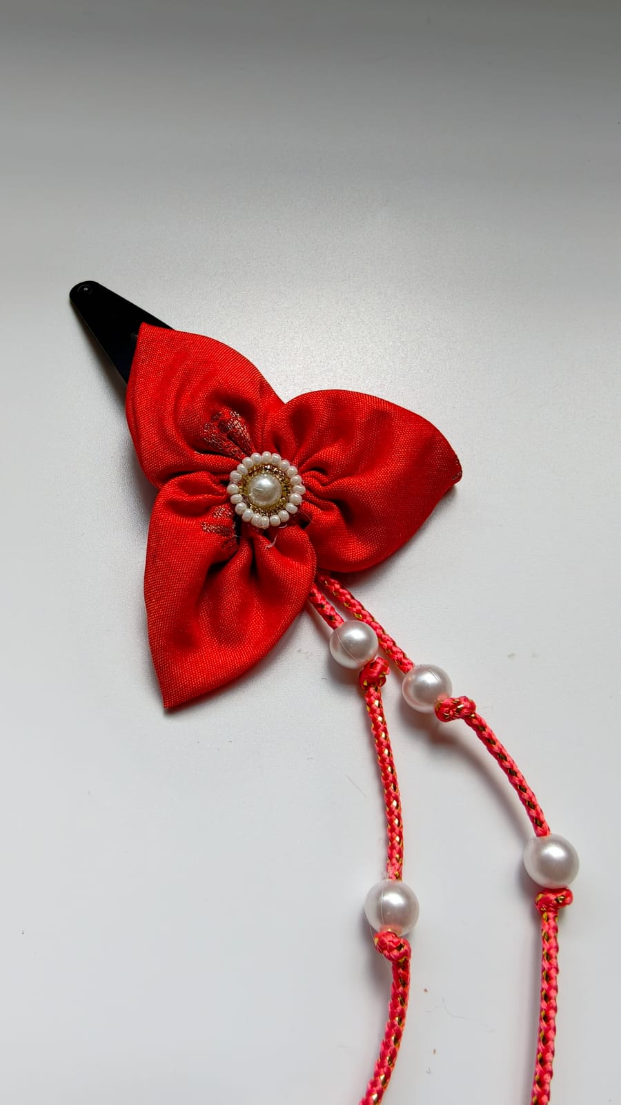 Bilwa Orange Fabric Hairclip With Dangling Pearls Strands
