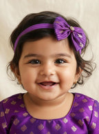Purple Brocade Bow Elasticated Headband For Baby Girl