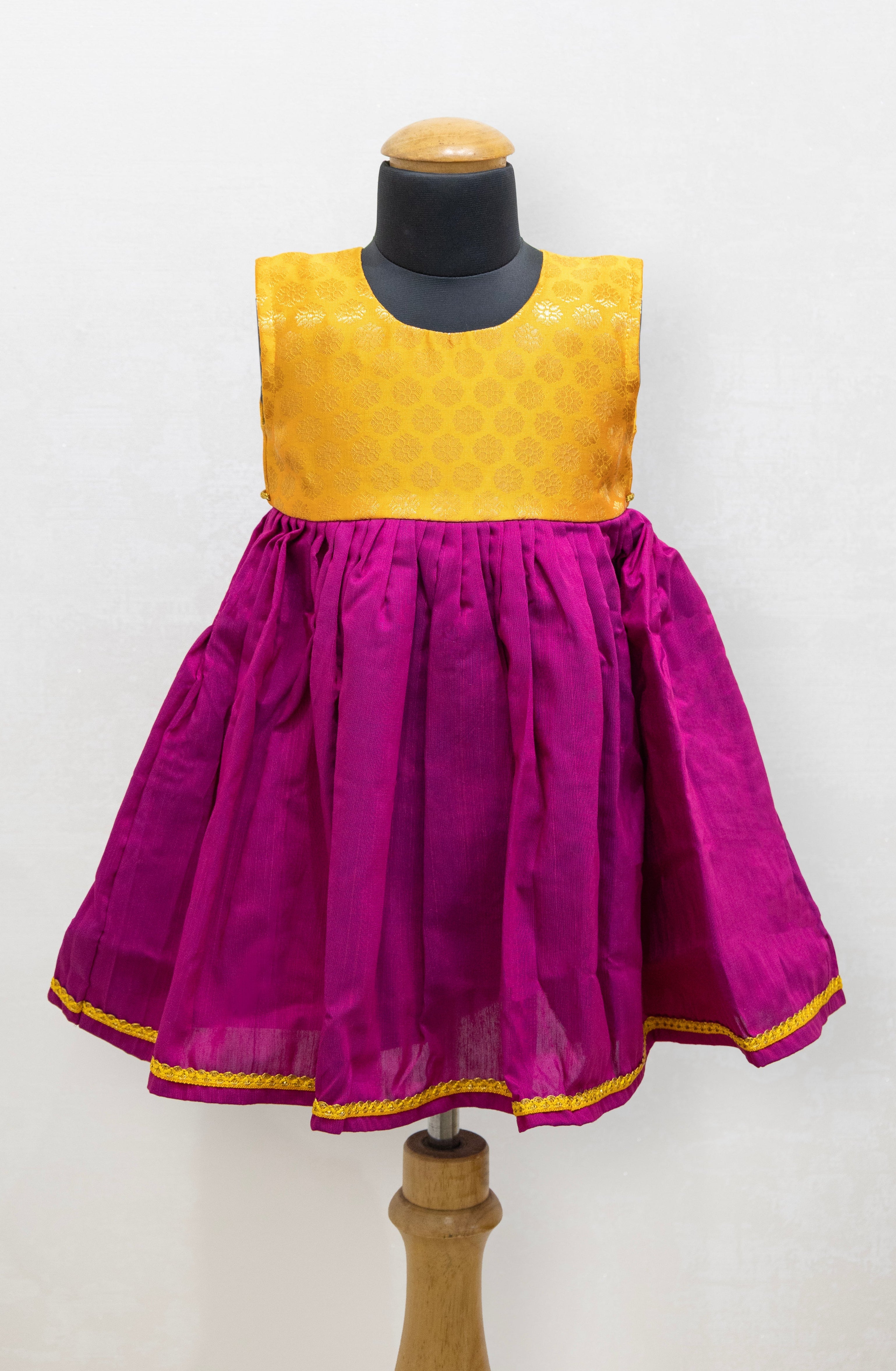 Yellow banaras brocade bodice with magenta raw silk flared dress