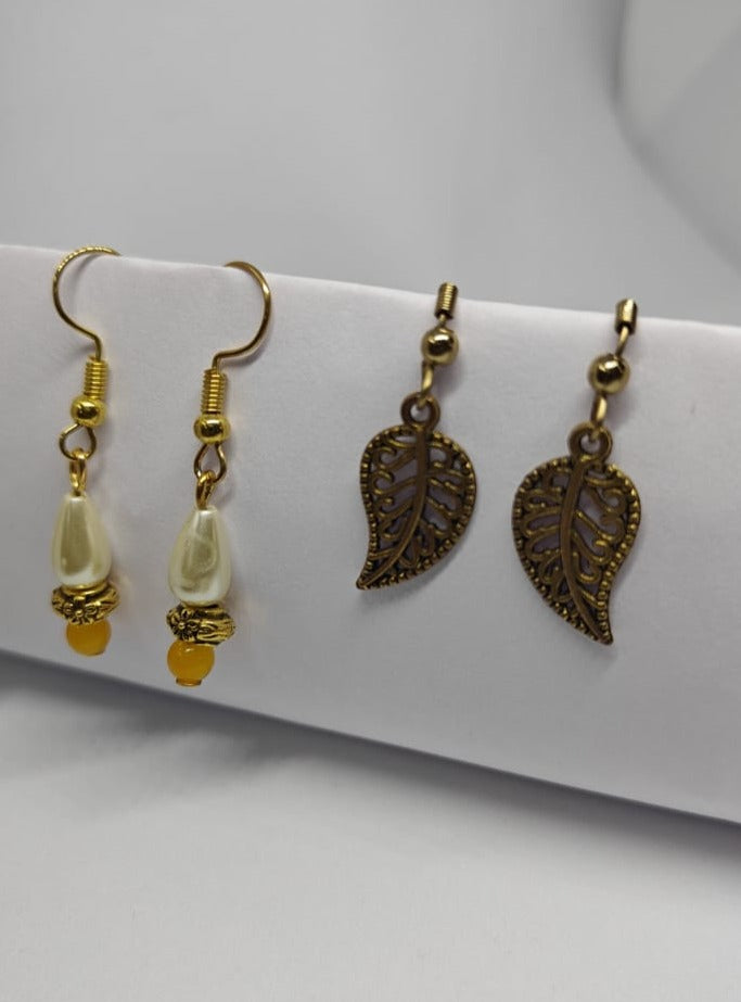 Accessories gifts fancy traditional ethnic trendy handmade accessories handcrafted matching assorted mix n match pearl multicolour metal golden nath nose pin nathani Marathi gold plated Maharashtrian accessory zumka jhumka moti vel single layer double layer dangling 