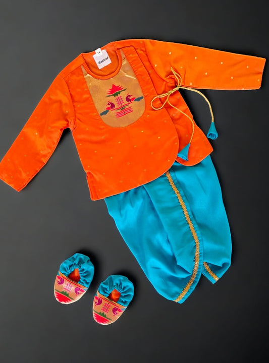 Orange brocade Angrakha kurta with Peacock Paithani yoke teamed with contrast teal blue dhoti for newborn baby boy.It's the perfect outfit for your baby's naming ceremony,naamkaran,annaprashan ceremony.Traditional dress for Noolukettu Ceremony,Pachavi Puja,cradle ceremony,Rice Ceremony,Chatti Puja etc. Apt gifting idea