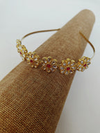 Kundan studded flower and leaves motifs mathapatti headband in golden metal for Girls.Adorn your princess with head to toe premium quality handcrafted accessories made from allergy free, best quality materials.