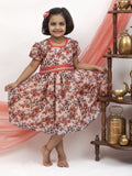 Peach Floral Chanderi Flared Dress With a dainty sequined lace pattern at waist for Girls.Let your princess be as comfortable as in her casuals with carefully designed & crafted Comfort Ethnic Wear by Soyara Ethnics.Keep her fashion quotient high with timeless patterns, vibrant combinations and royal textiles.