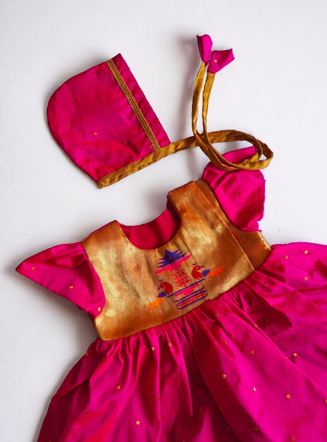 Rani Pink Paithani brocade silk,front open newborn dress for naming ceremony with bonnet, bloomer and booties.It's the perfect outfit for your baby's naming ceremony,naamkaran or annaprashan ceremony.Traditional dress for Noolukettu Ceremony,Pachavi Puja,cradle ceremony,Rice Ceremony,Chatti Puja etc. Apt gifting idea 