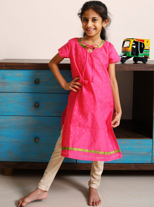 Pink Chanderi kurti with neck pattern.Let your princess be as comfortable as in her casuals with carefully designed & crafted Comfort Ethnic Wear by Soyara Ethnics.Keep her fashion quotient high with timeless patterns, vibrant combinations and royal textiles.